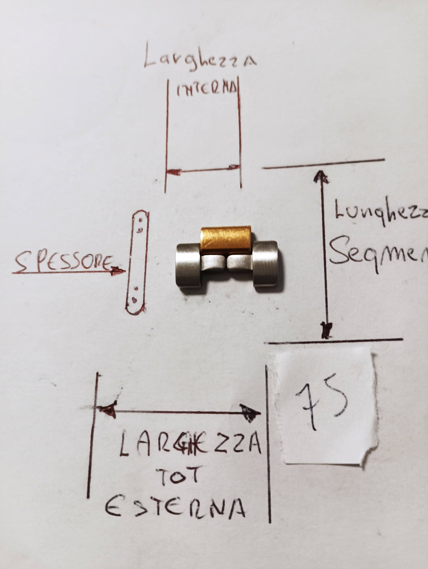 Maglia aggiuntiva per bracciale color acciaio e oro delle dimensioni di 19,11 m.m. di larghezza massima e di minima 9,5 m.m. spessore 2,7 m.m. larghezza Segmento 8,90 m.m.