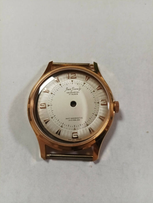 Cassa vintage Nos per un vintage progetto marchiato Jean Grandy Neuschatel delle dimensioni di 33 mm. Con anse da 16,60 , e quadrante con secondi piccoli a ore 6 piedini a ore 10,59 e ore 4.