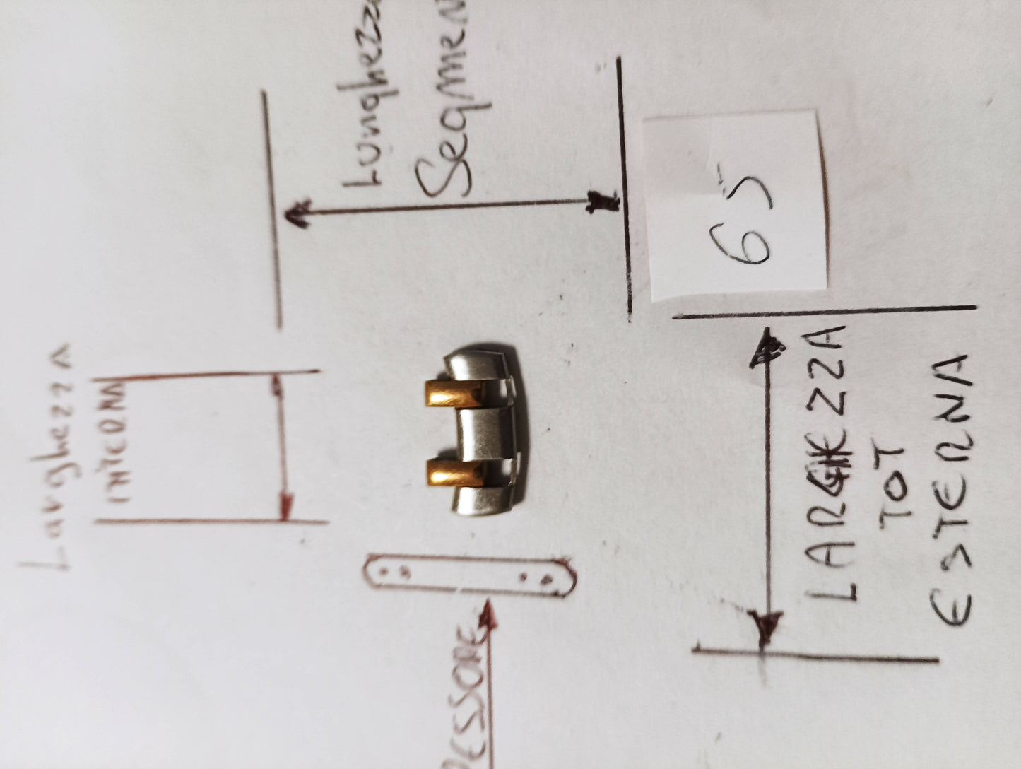 Maglia aggiuntiva per bracciale color acciaio e oro delle dimensioni di 15,96 m.m. di larghezza massima e di minima 9,9 m.m. spessore 2,34 m.m. larghezza Segmento 6,54 m.m.