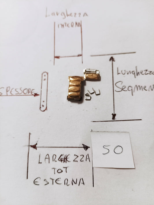 Maglia aggiuntiva per bracciale color oro modello elastico dimensioni larghezza massima 6,34 m.m. spessore 3,36 m.m. lunghezza segmento 2,89 m.m.