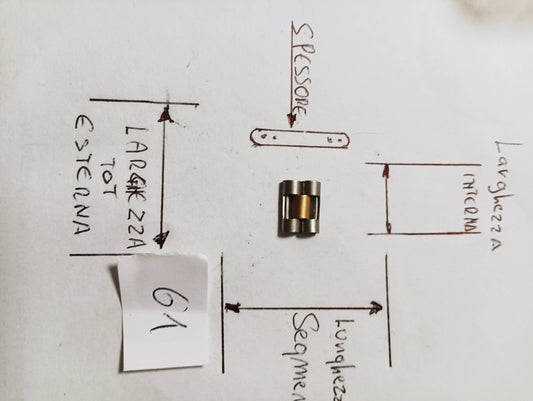 Maglia aggiuntiva per bracciale color acciaio e oro delle dimensioni di 11,26 m.m di larghezza massima e di minima 4,89 m.m. spessore 2,54 m.m. larghezza Segmento 4 m.m.