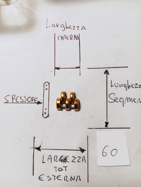 Maglia aggiuntiva per bracciale color oro delle dimensioni di 13,03 m.m. larghezza massima e di minima 7,66 m.m. spessore 3,18 m.m. larghezza segmento 7,11.