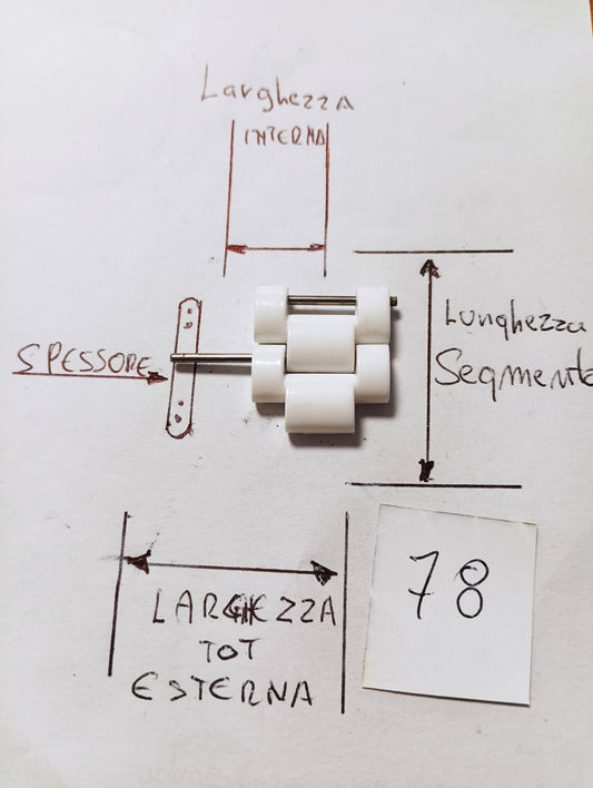 Maglia aggiuntiva per bracciale color bianco in materiale sintetico,della larghezza massima di19,54 m.m.e di minima 9,75 m.m. spessore 5,24 m.m. lunghezza segmento 8,6 m.m..