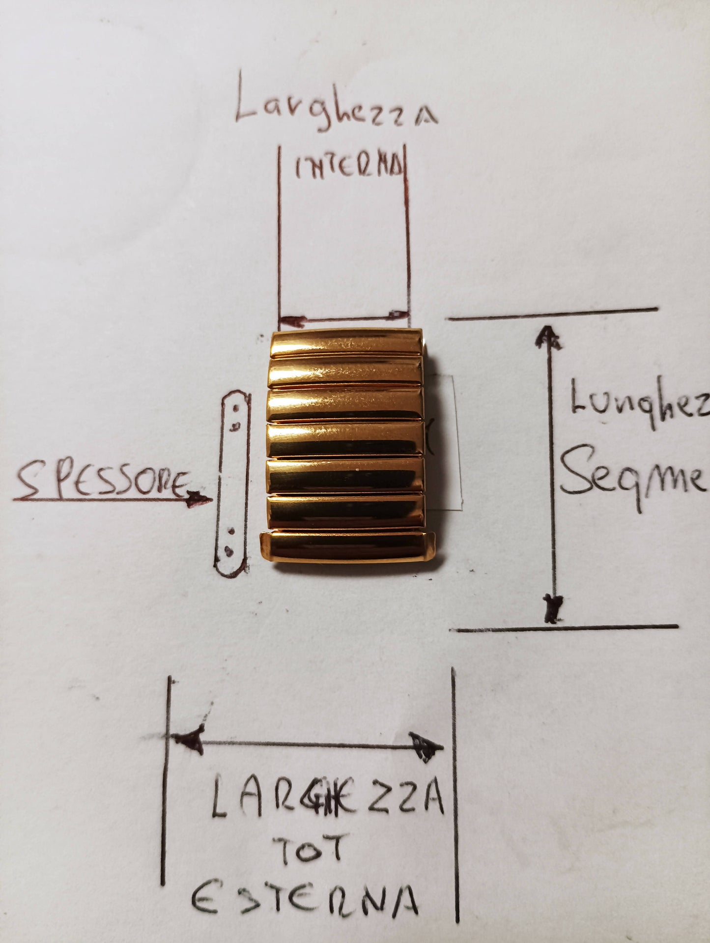 Maglia aggiuntiva per bracciale color oro modello elastico, dimensioni larghezza massima 16,87 m.m. spessore 4,41 m.m. lunghezza segmento 3,83 m.m.